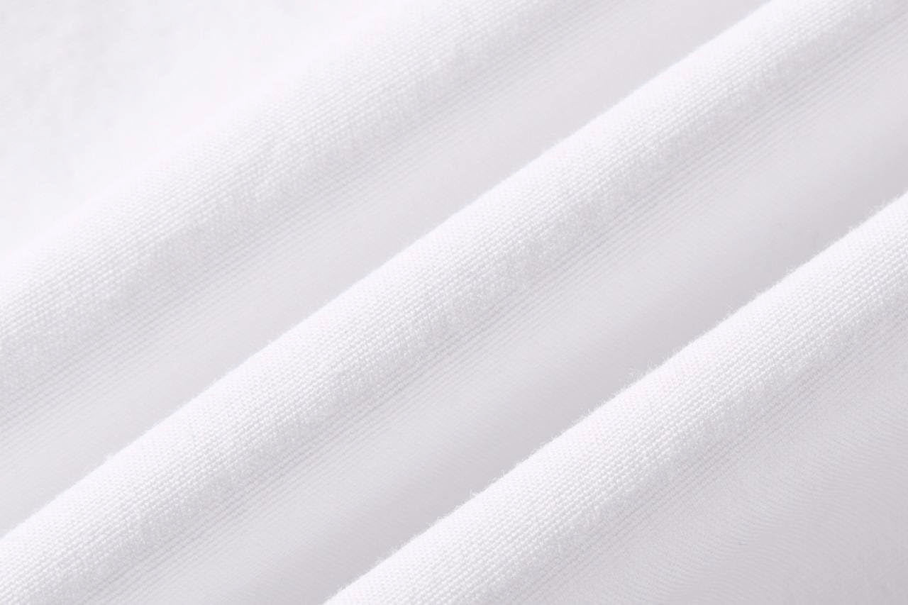 Close-up of soft white cotton fabric texture with gentle folds.