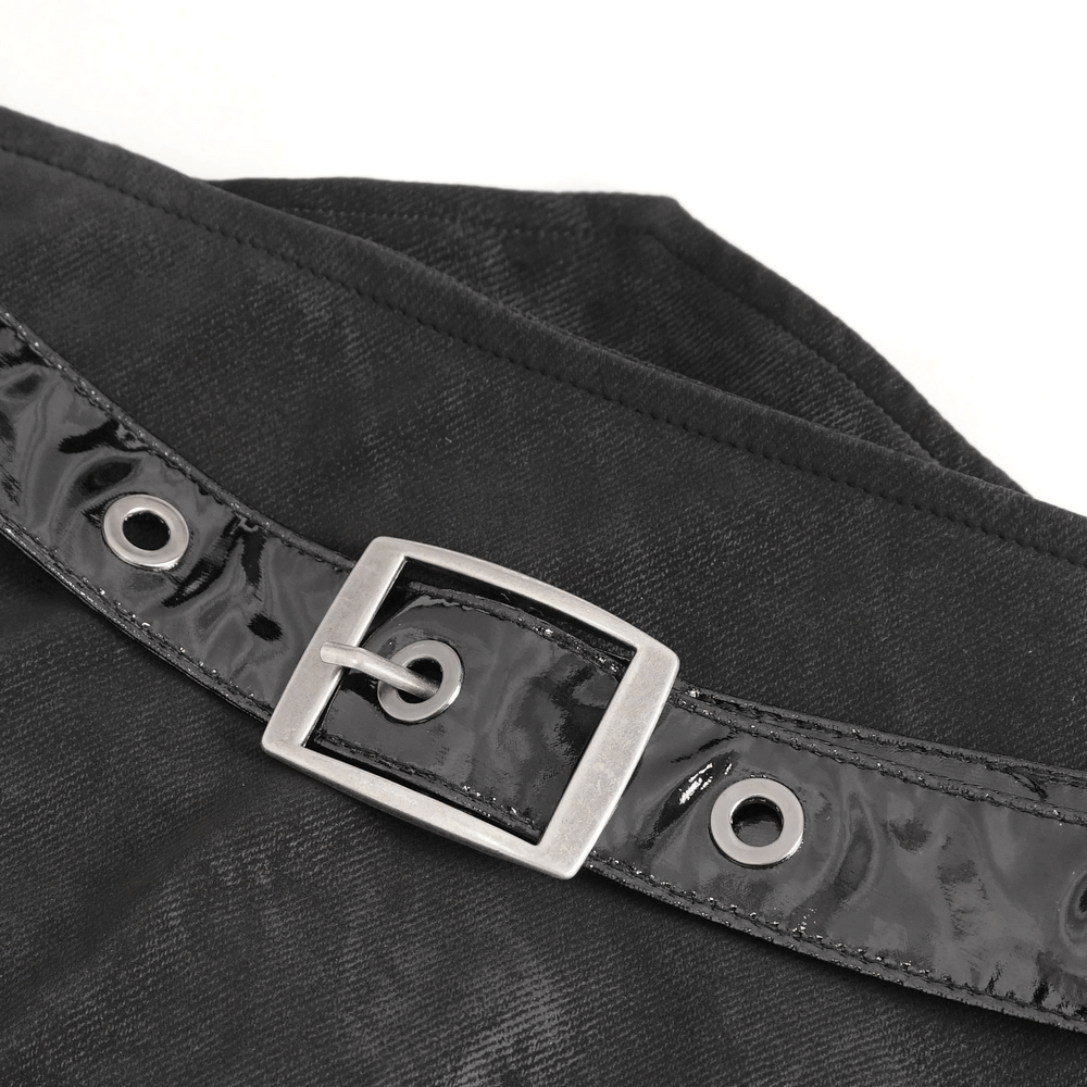 Close-up of sleek black skirt belt with shiny buckle and grommet details, adding stylish flair to your outfit.