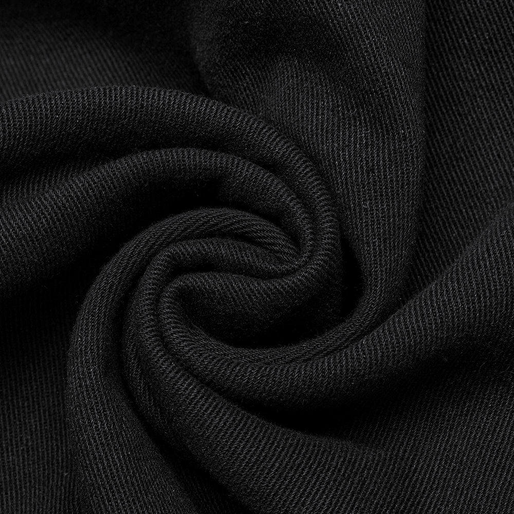 close-up of sleek black fabric showcasing the texture of the woven twill for gothic pants.