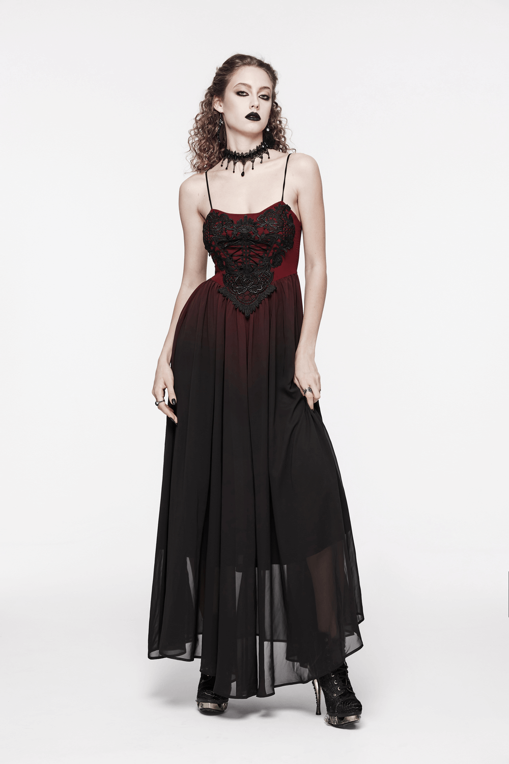 Sleek gothic long dress in burgundy and black with adjustable straps and floral embroidery, perfect for formal events.