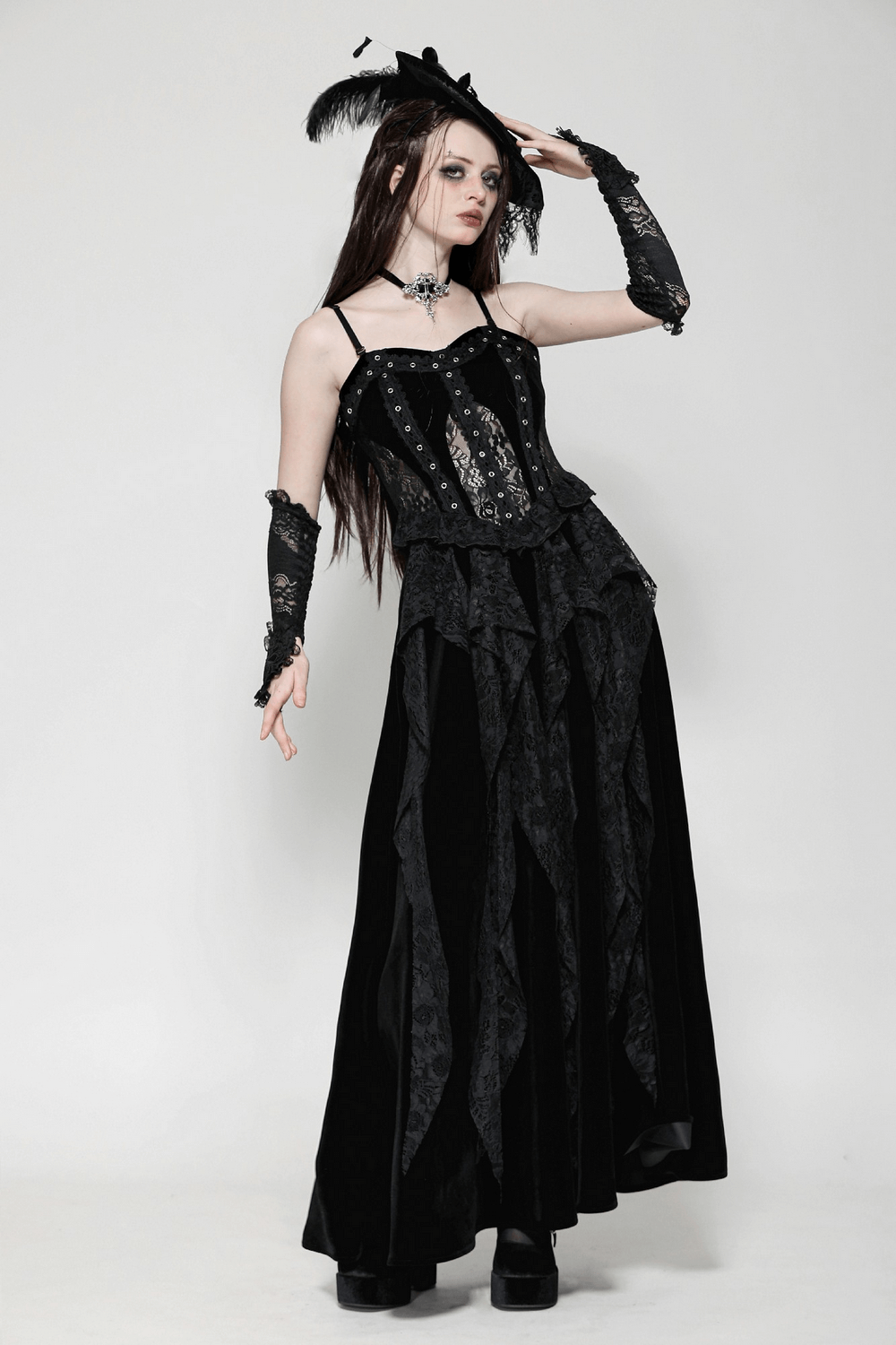 Gothic lace and velvet corset dress with ruffled details, featuring a structured bodice and dramatic flowing skirt.