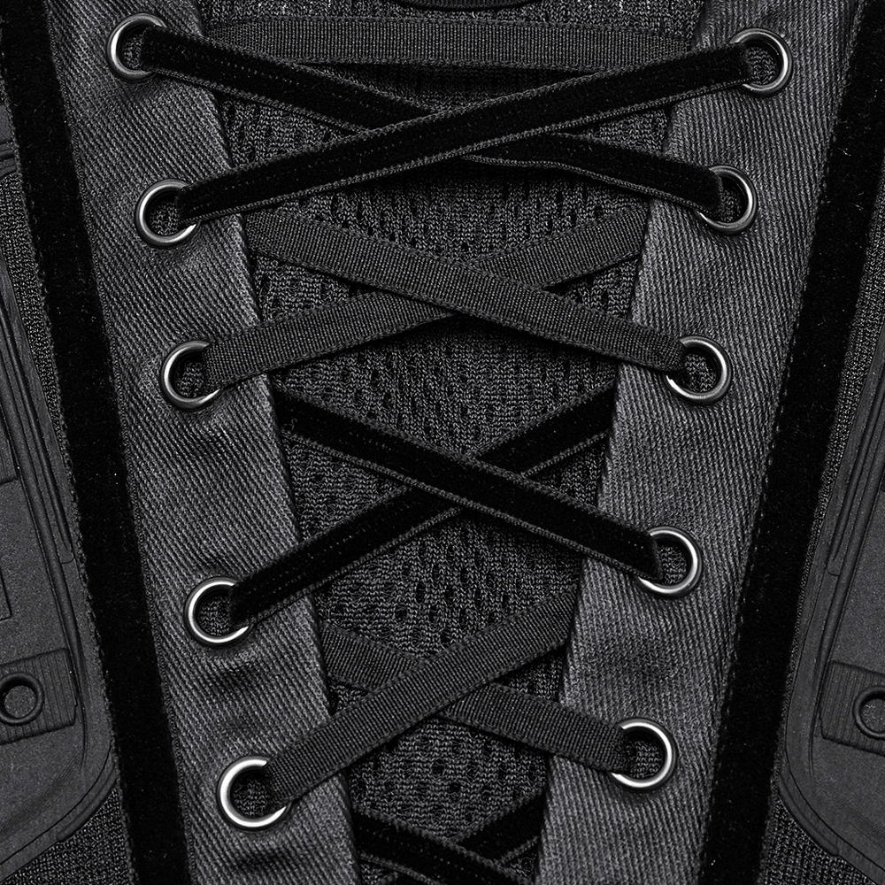 Close-up of black lace-up detailing on sleek underbust corset, showcasing cyberpunk style and edgy design.