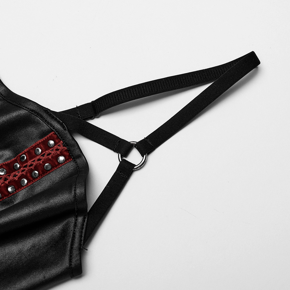 Close-up of adjustable straps on a sleek punk dress with red rivet detailing, showcasing its edgy style and slim fit.
