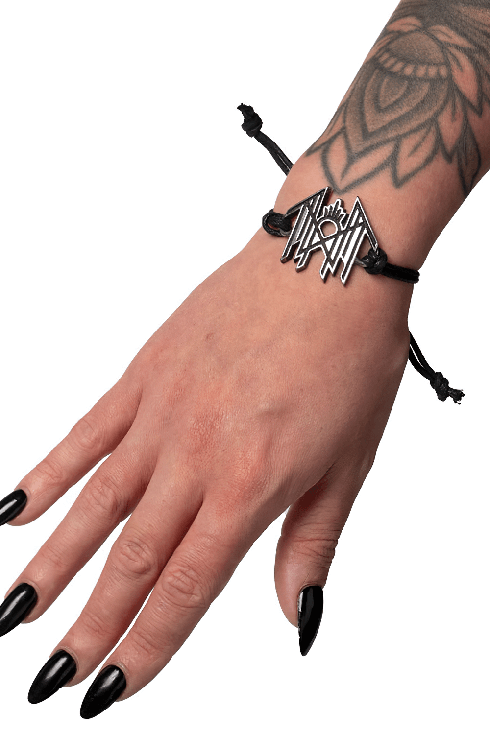 Close-up of a hand wearing a black cord wrist bracelet with an antiqued pewter Sleep Token logo.