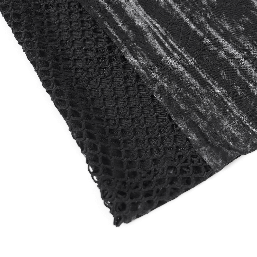 Close-up of black gothic top fabric featuring mesh side panels and distressed stripes.