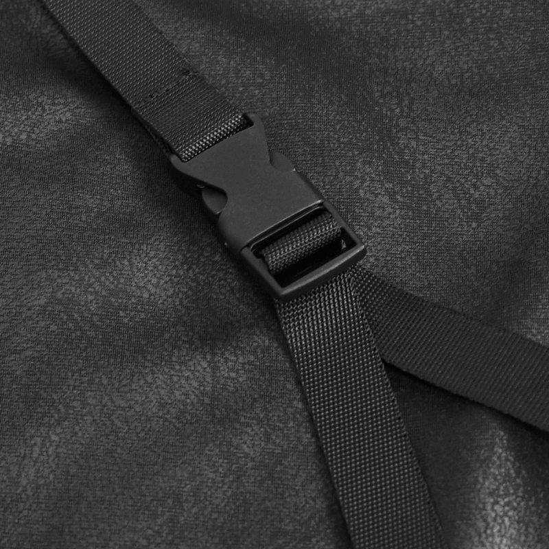 Close-up of adjustable black buckle strap on gothic women's clothing, emphasizing stylish detailing.