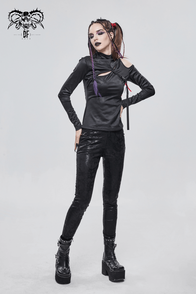 Gothic black long sleeve cutout top for women, stylish alternative clothing, paired with shiny black leggings and platform boots.