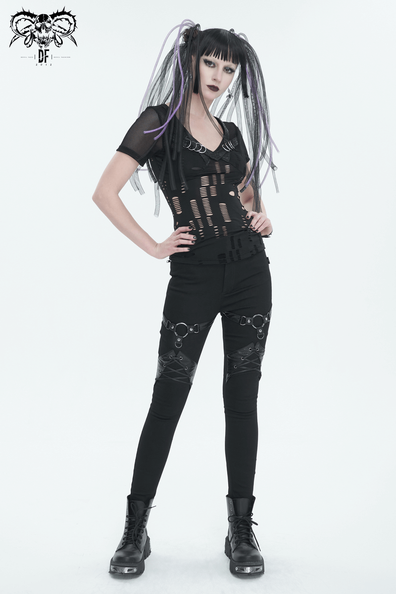 Edgy women's slim fit pants with rings and lace-up details, styled in punk fashion with zipper pockets.