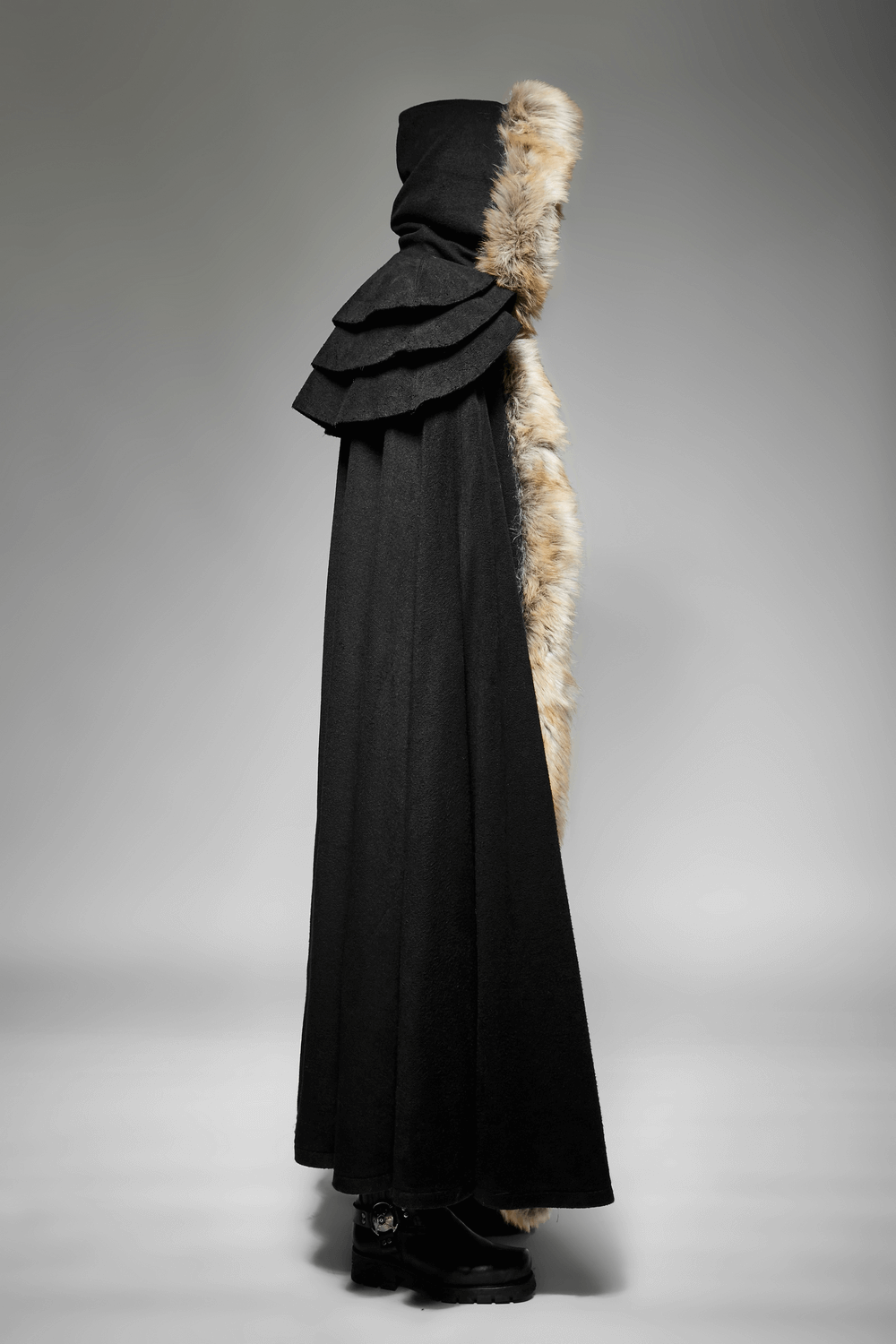 Side view of a sophisticated black gothic cloak with faux fur trim and layered wool collar.