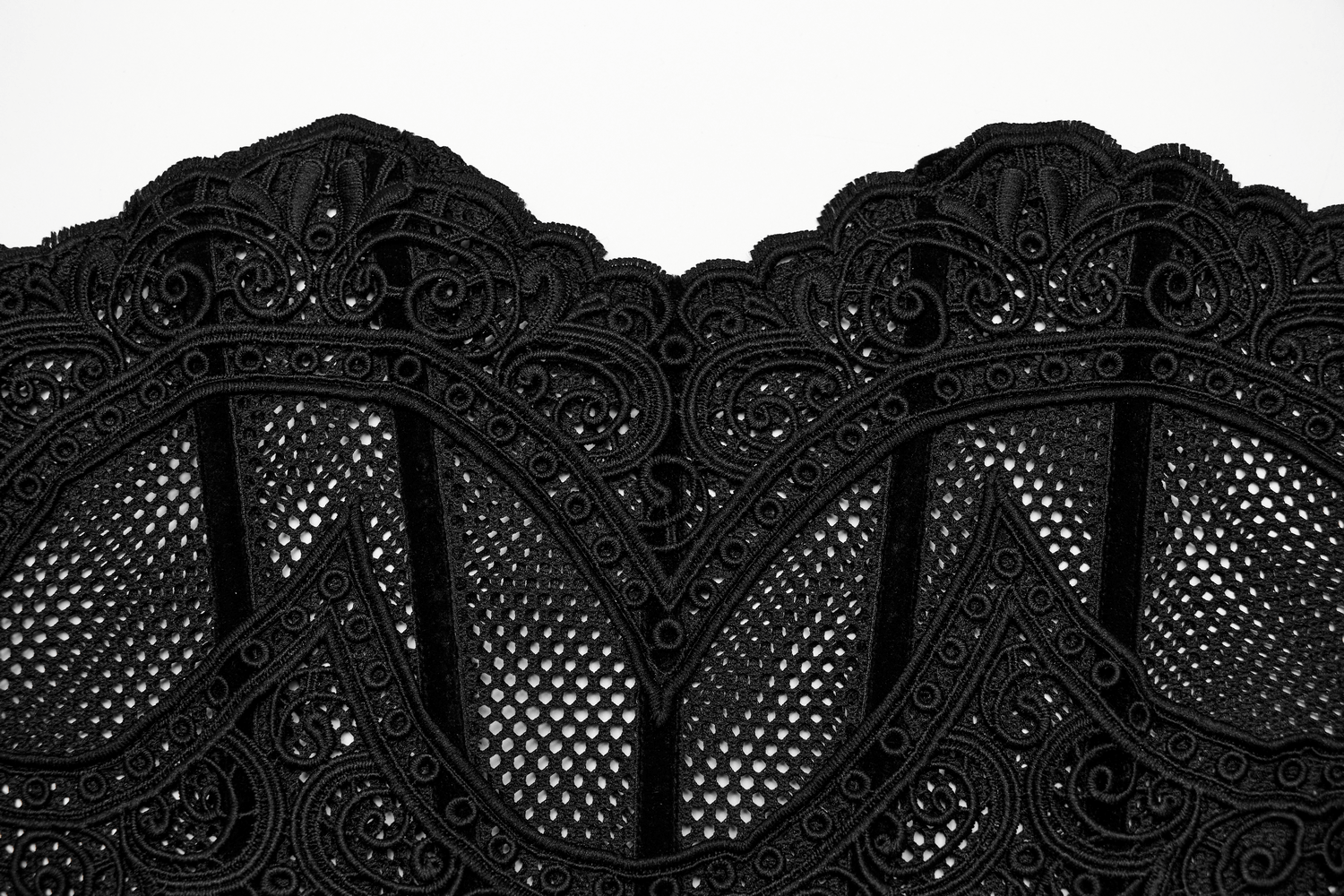 Close-up of a black gothic lace corset belt with intricate mesh detailing and elegant design elements.