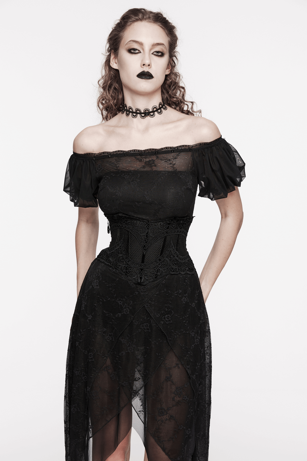 Edgy model wearing a black gothic lace corset belt with off-shoulder dress and choker, embodying elegance and sophistication.