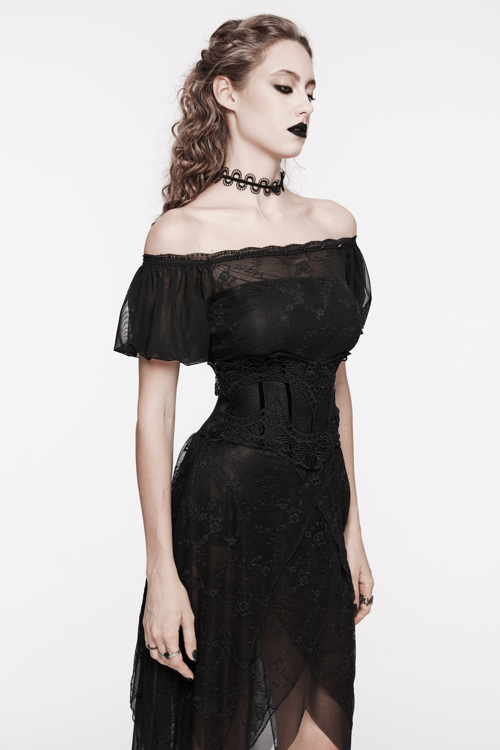 Elegant model in black gothic lace corset belt and off-shoulder dress, exuding a sophisticated and edgy vibe.