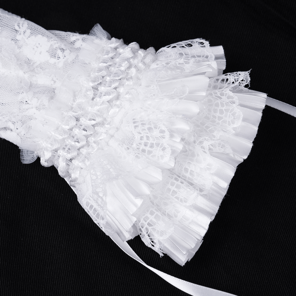 Elegant bridal lace fingerless gloves with tulle accents and ribbon, perfect for a chic wedding look.