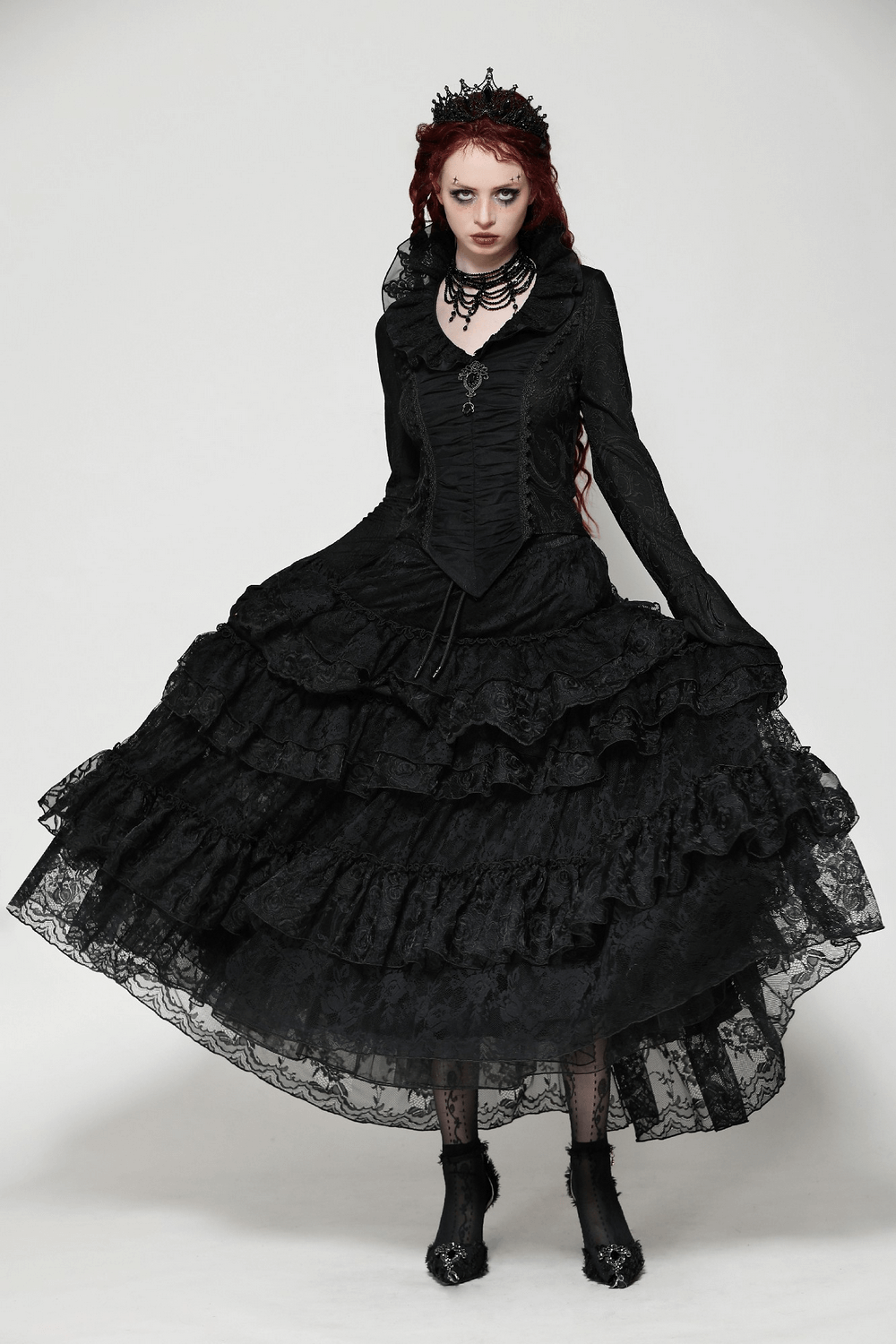 Elegant black lace dress with ruffled skirt and Victorian-inspired design, perfect for gothic or formal occasions.