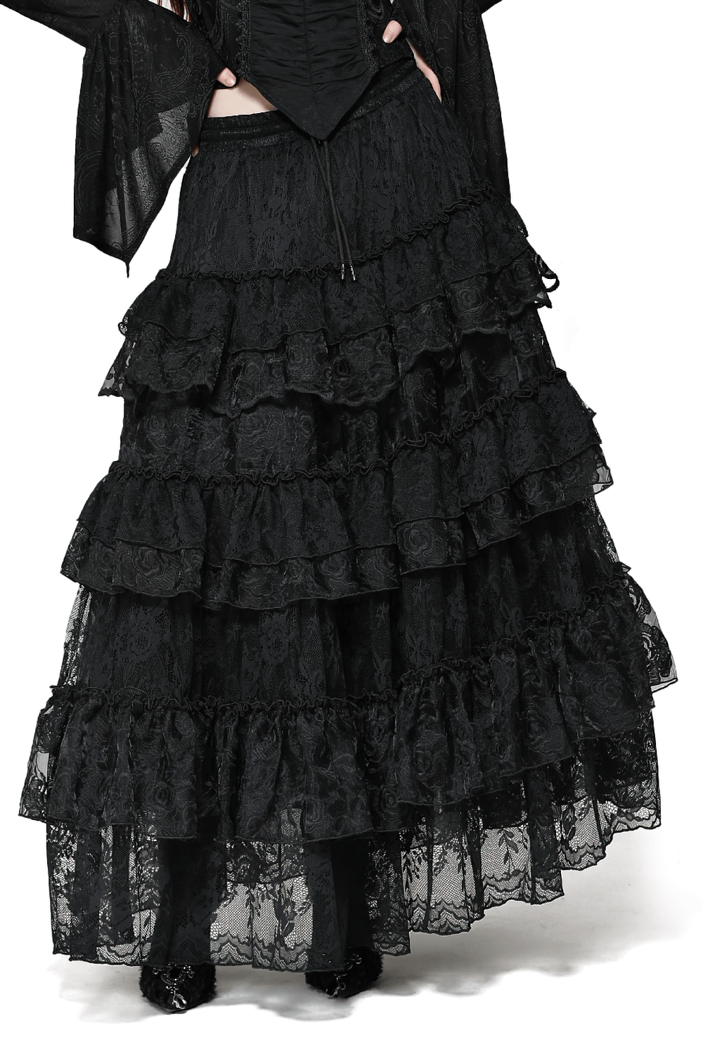 Elegant black lace tiered skirt with ruffle details, perfect for sophisticated outfits, showcasing delightful layering.