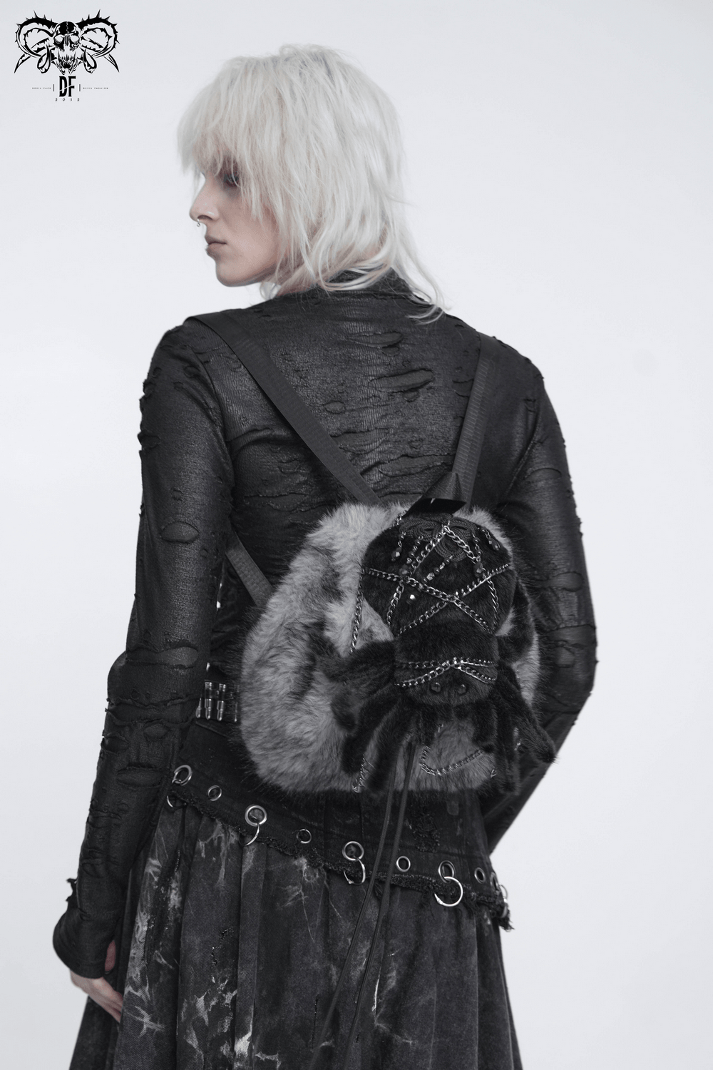 Spider Backpack with Faux Fur and Metal Chain Details worn by model, showcasing punk style and gothic design.