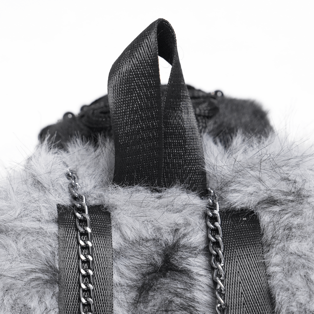 Spider Backpack with Faux Fur and Metal Chain Details showing fuzzy grey body and top handle.