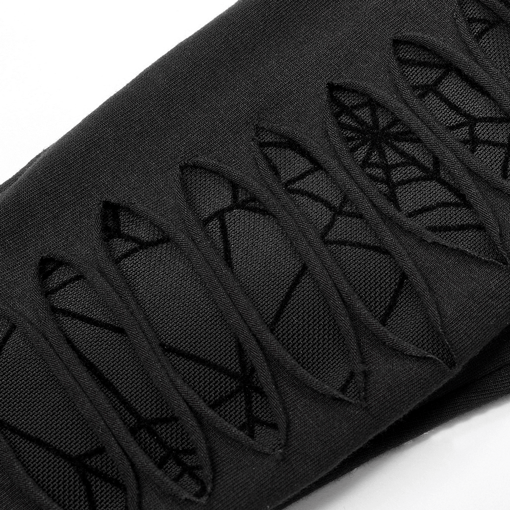 Close-up of black spider mesh detail on unique Goth gloves, showcasing distinctive cut and stylish design.