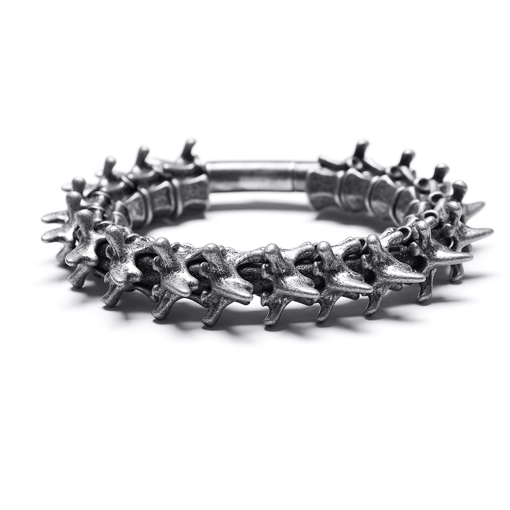 Spike-adorned metal bracelet showcasing edgy fashion for bold individuals. Perfect accessory to stand out in style!