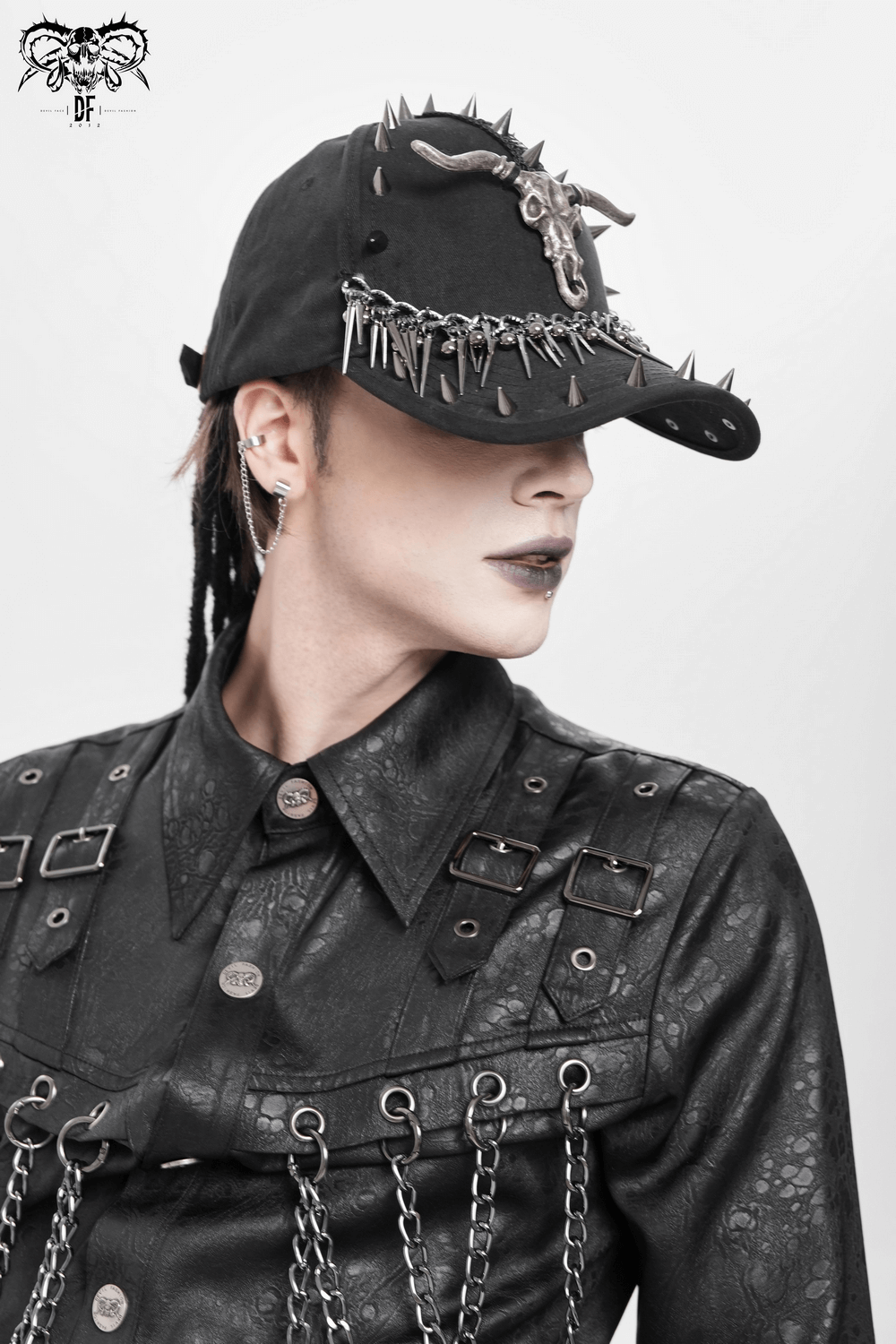 Spiked Bull Skull Chain Gothic Baseball Cap for Rockers worn by model in punk style, showcasing spikes and chains.