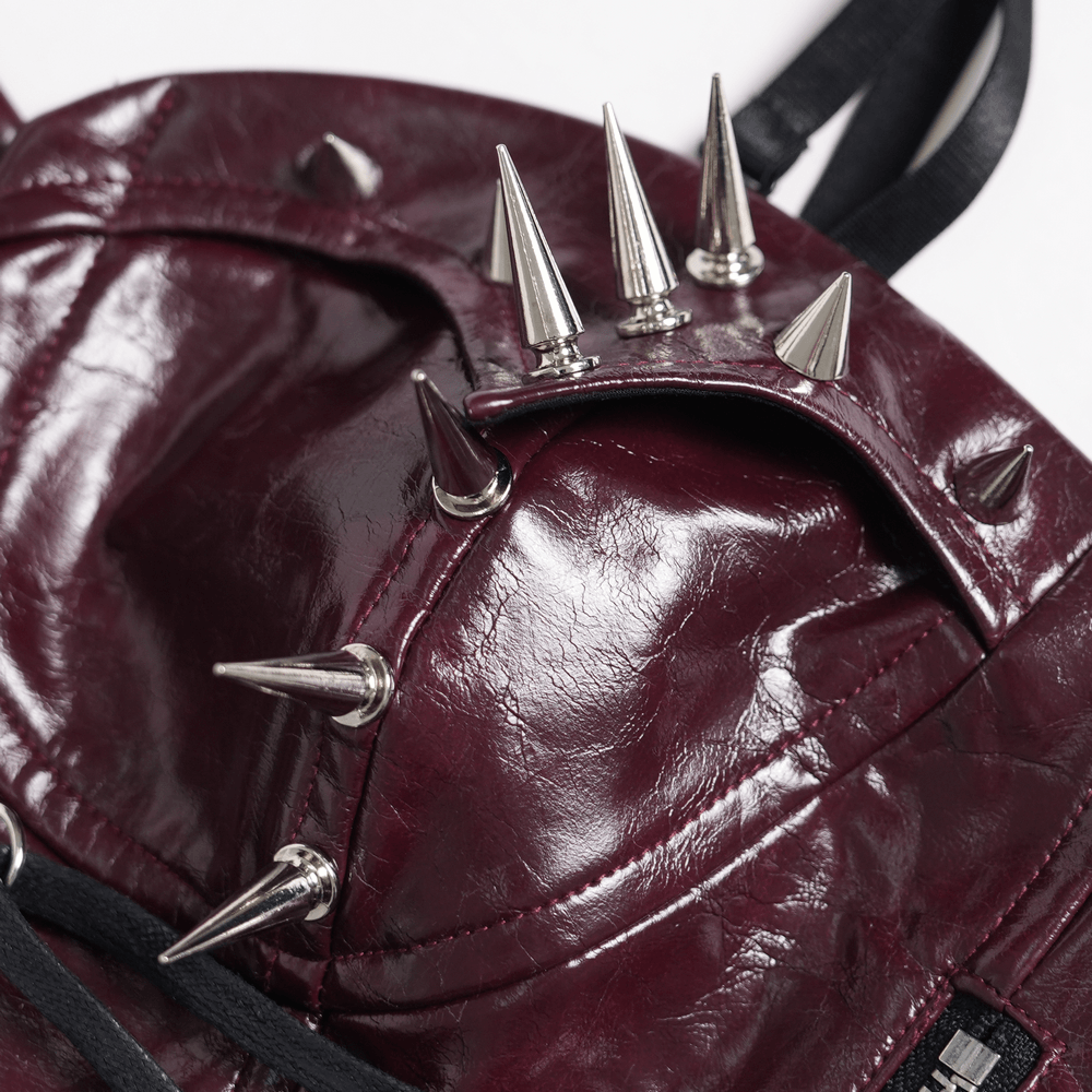 Spiked Burgundy Faux Leather Gothic Corset Top with Zips featuring sharp spikes and glossy finish.