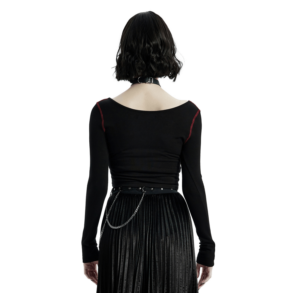 Back view of a woman in a black punk crop top with red accents, showcasing an edgy style.