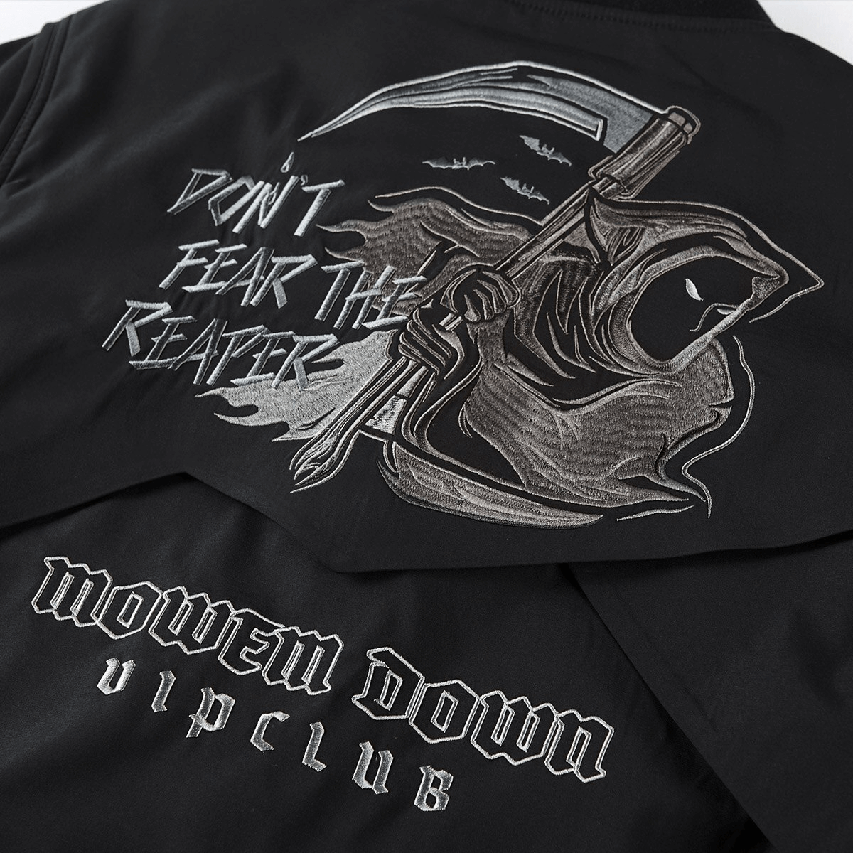 Stylish men's bomber jacket with grim reaper motif and 'Don't Fear the Reaper' embroidery for a bold look.