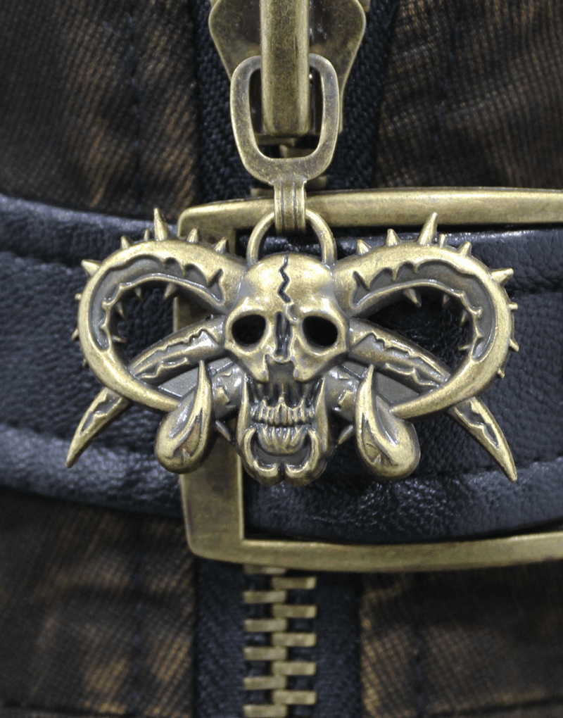 Close-up of a steampunk vest's copper buckle featuring a detailed skull and ram horns design.