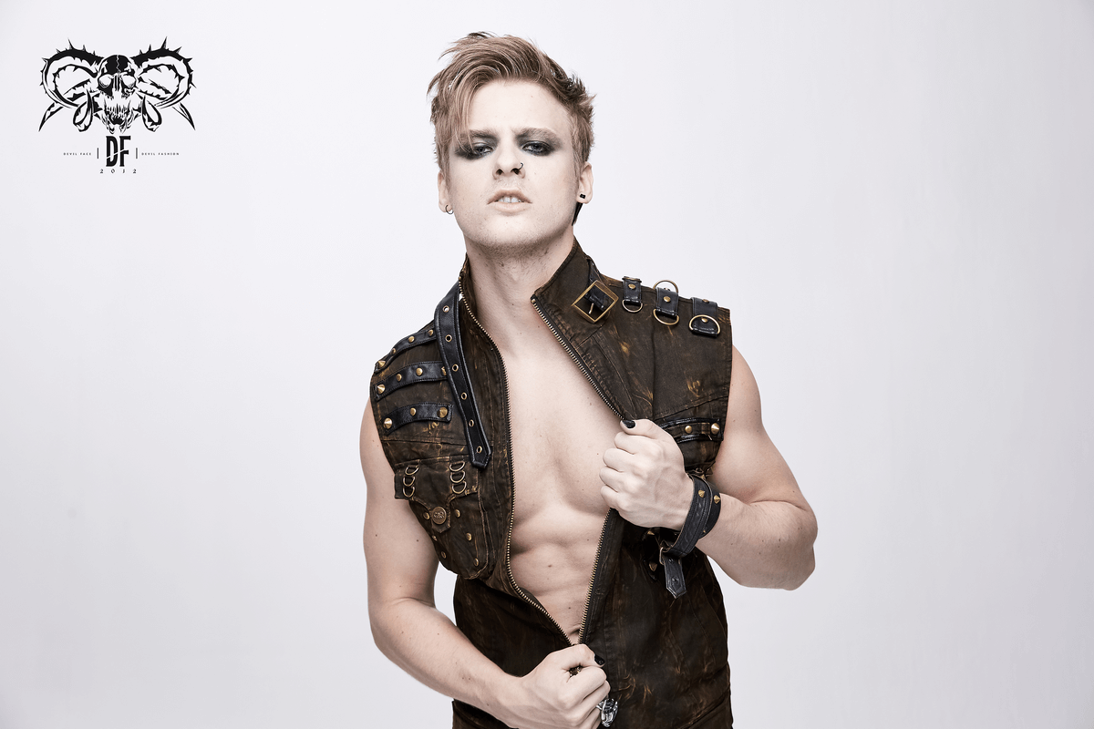 Stylish male model showcasing a steampunk biker style zipper sleeveless waistcoat with bronze rivets and edgy design.