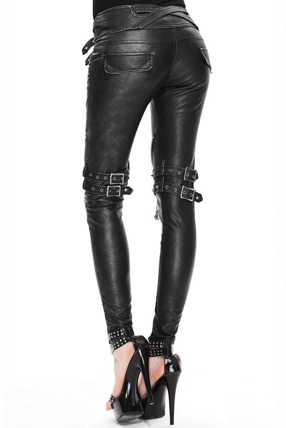 Back view of stylish women's steampunk black PU leather pants with rivets and belts, perfect for a gothic look.