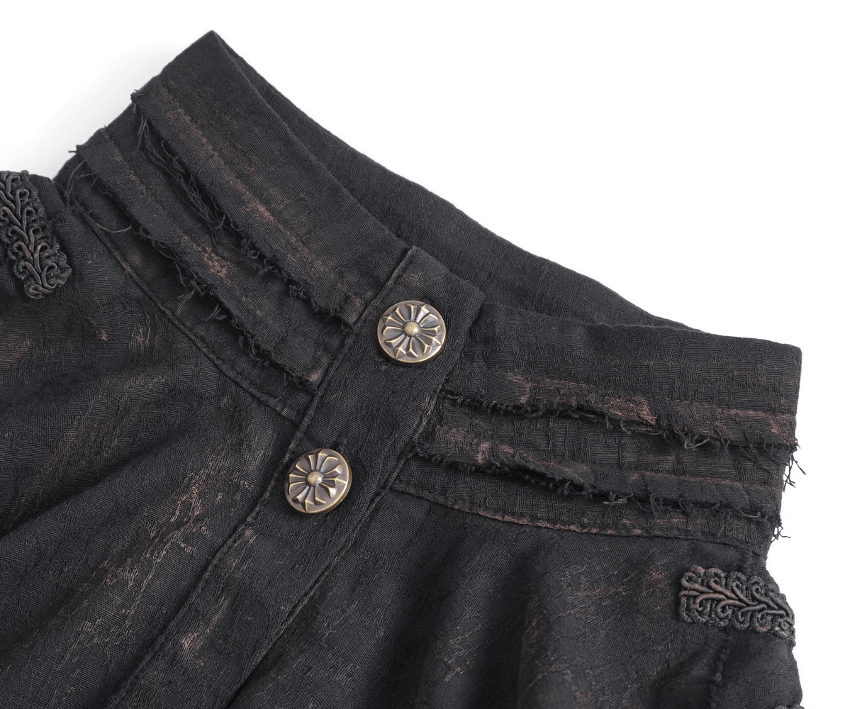 Close-up of steampunk black ruffle high collar shirt with unique buttons and lace detailing.