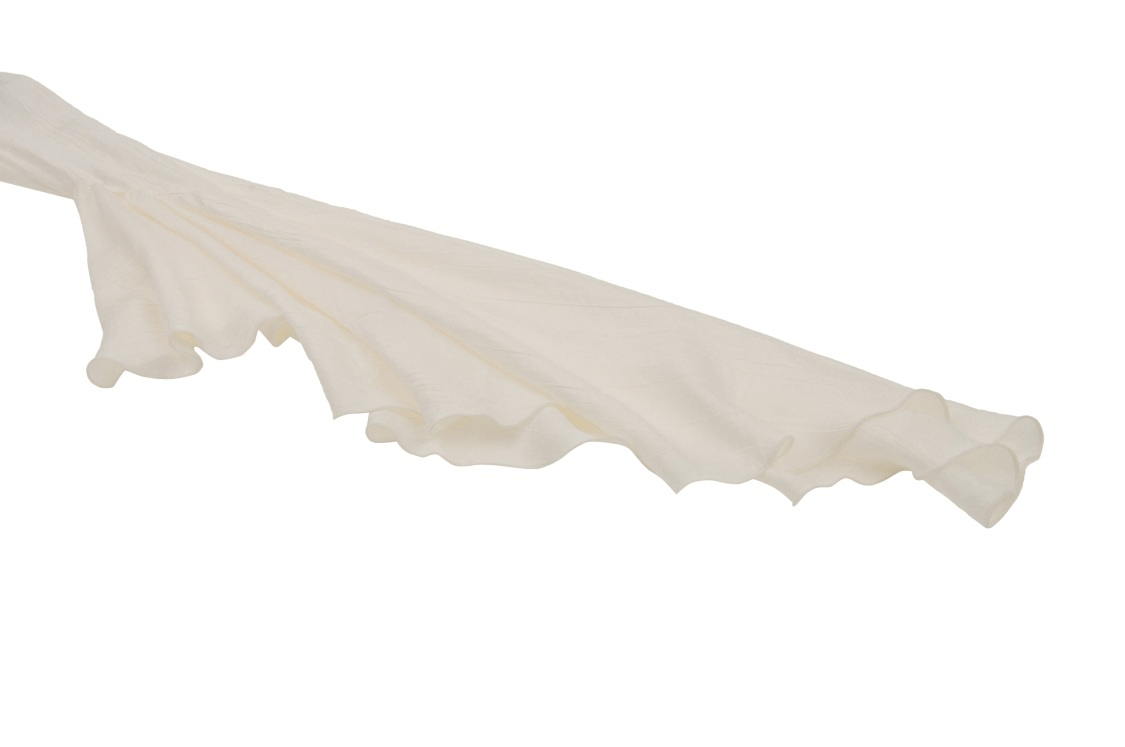 Elegant cream lace sleeve of a steampunk blouse, featuring a dramatic bell shape and ruffled edge for a romantic touch.