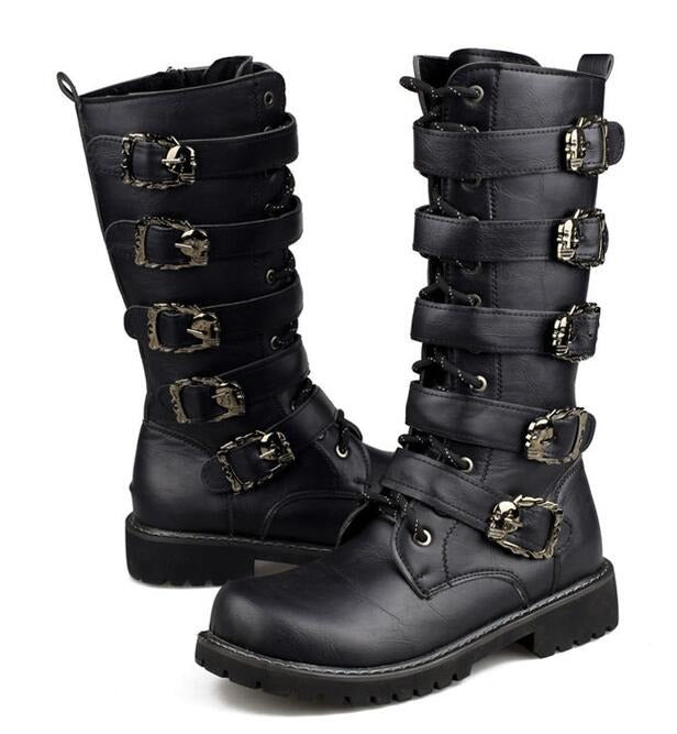 Steampunk mid-calf combat boots with skull buckles and rivets, perfect for goth fashion and rock festivals.