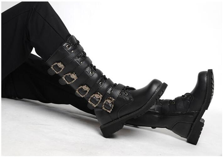 Steampunk mid-calf boots with skull buckles and rivets, perfect for gothic style enthusiasts.