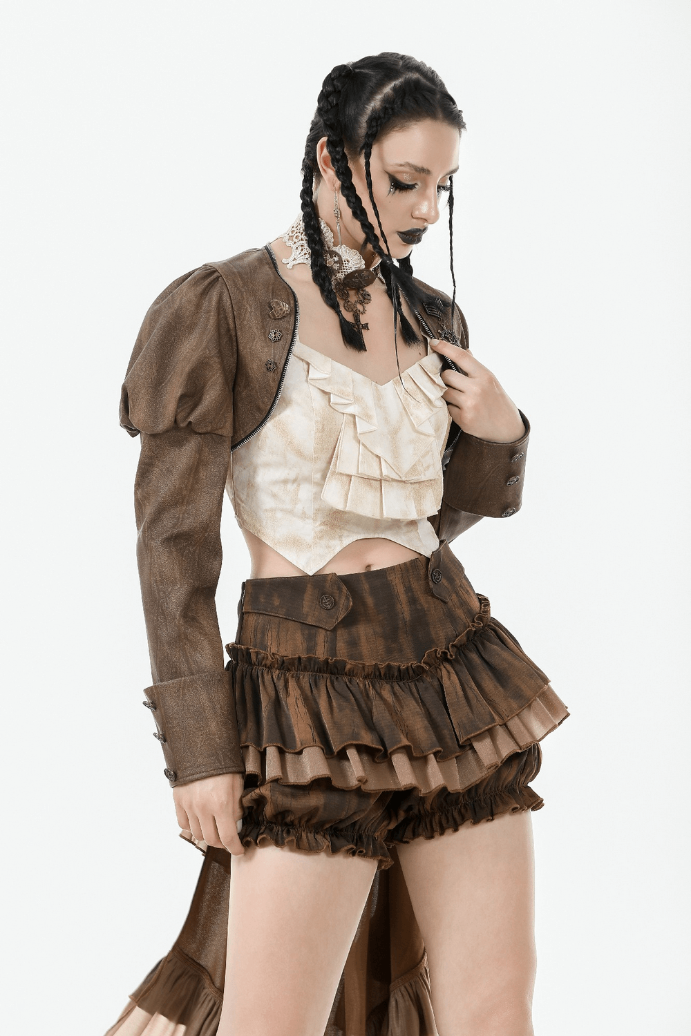 Model wearing a steampunk brown PU leather bolero shrug jacket with puffed sleeves and ruffled outfit, showcasing gothic style.