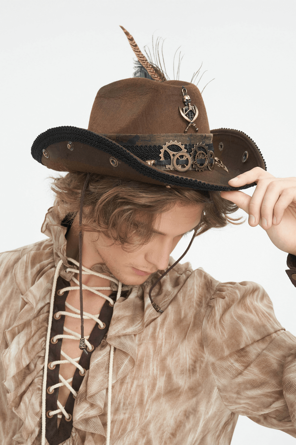 Model wearing a vintage-inspired steampunk brown hat with gears and a feather, styled with a rustic shirt.