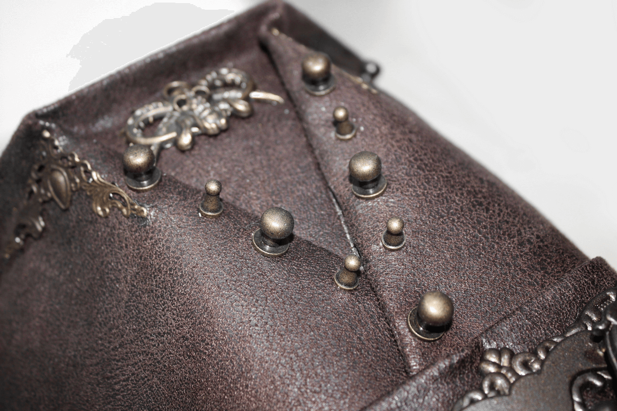 Close-up of a steampunk brown PU leather hat featuring bronze rivets and vintage decor detailing.