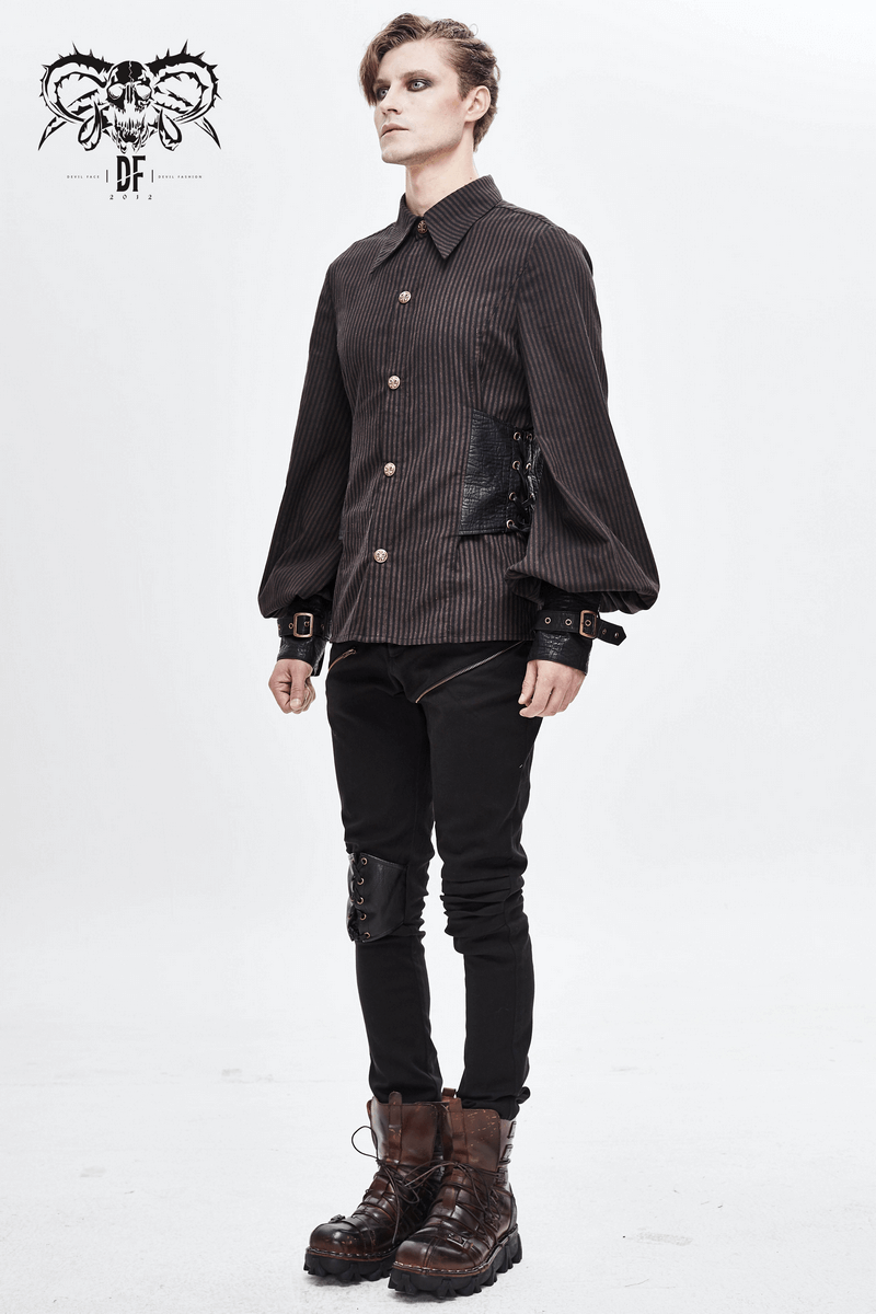 Model showcasing a men's steampunk striped shirt with PU leather inserts, paired with sleek black pants and rugged boots.