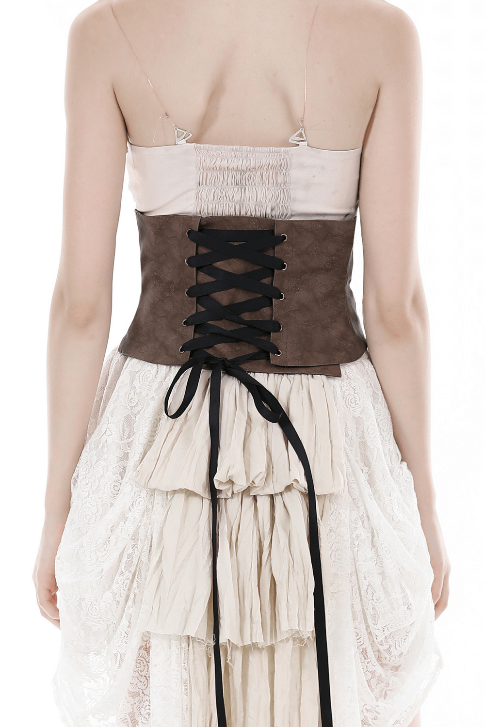 Back view of a brown faux leather double buckle corset belt worn over a flowing white dress.