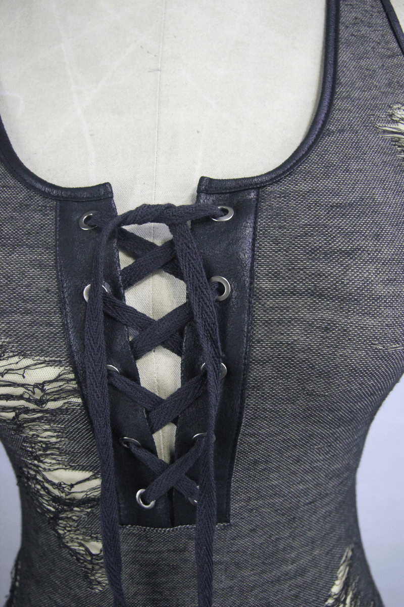 Close-up of a steampunk sleeveless tank top featuring lace-up front detail and stylish torn inserts.