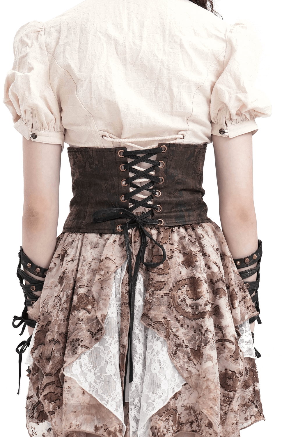 Back view of a woman wearing a steampunk gothic corset belt with lace-up detail, accessorized with a layered skirt.