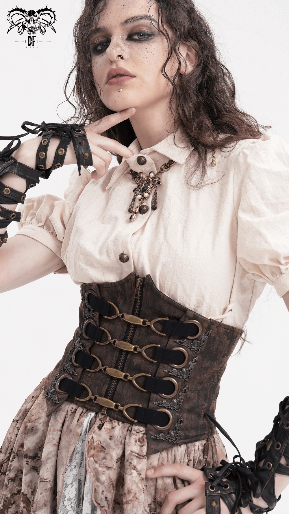 Stylish model showcasing a Steampunk Gothic corset belt with metal hooks and distressed finish, perfect for a dramatic look.