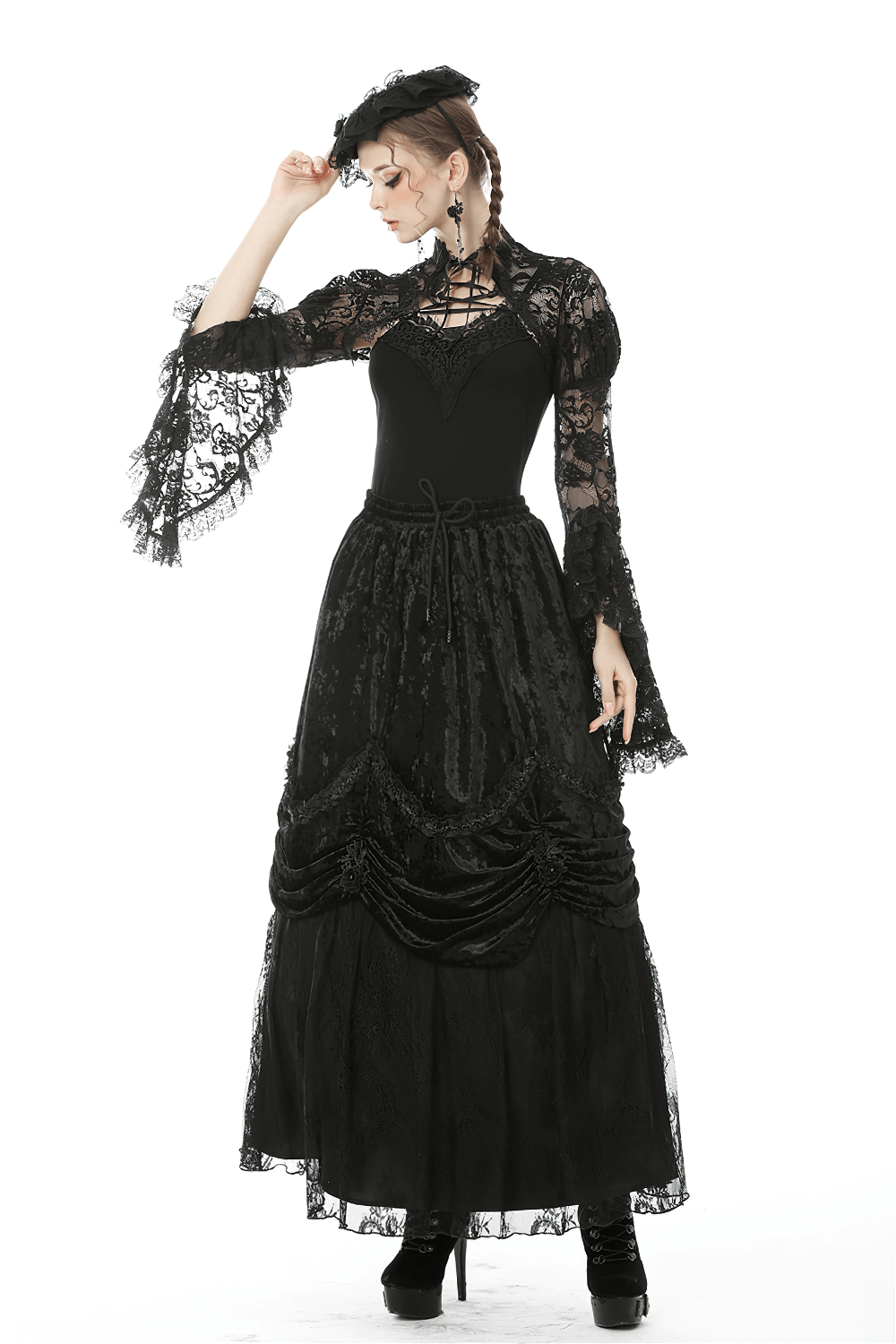 Elegant model wearing a black steampunk gothic maxi skirt with ruffles and lace for a gothic Victorian look.