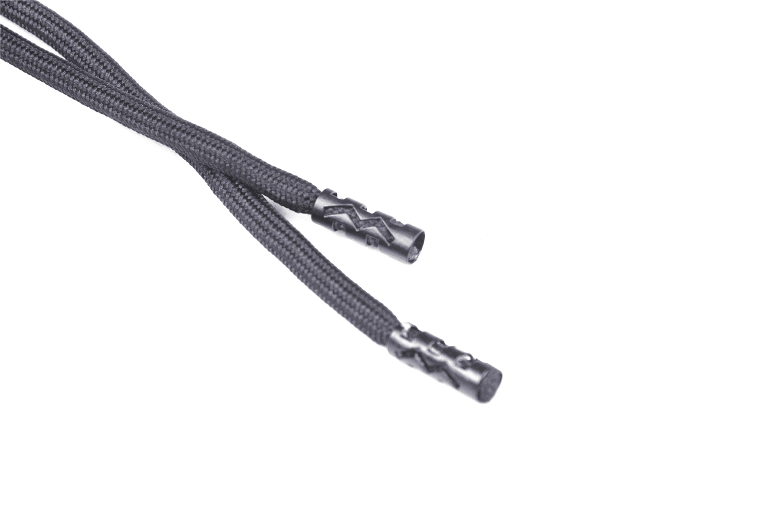 Close-up of black braided cord with decorative tips, perfect for accessories and crafts.