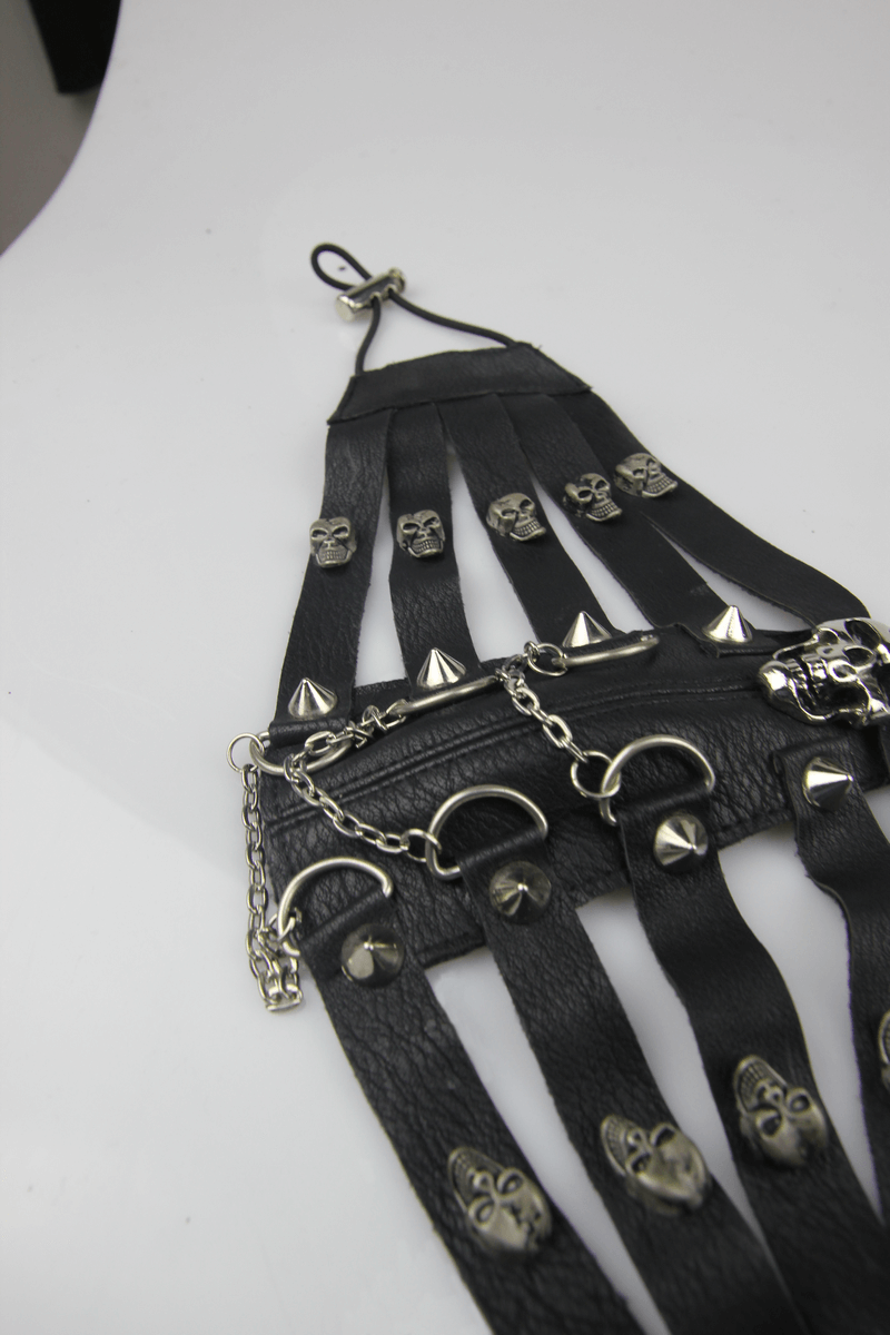 Steampunk men's black leather mask with spikes and skull accents, perfect for edgy gothic fashion.