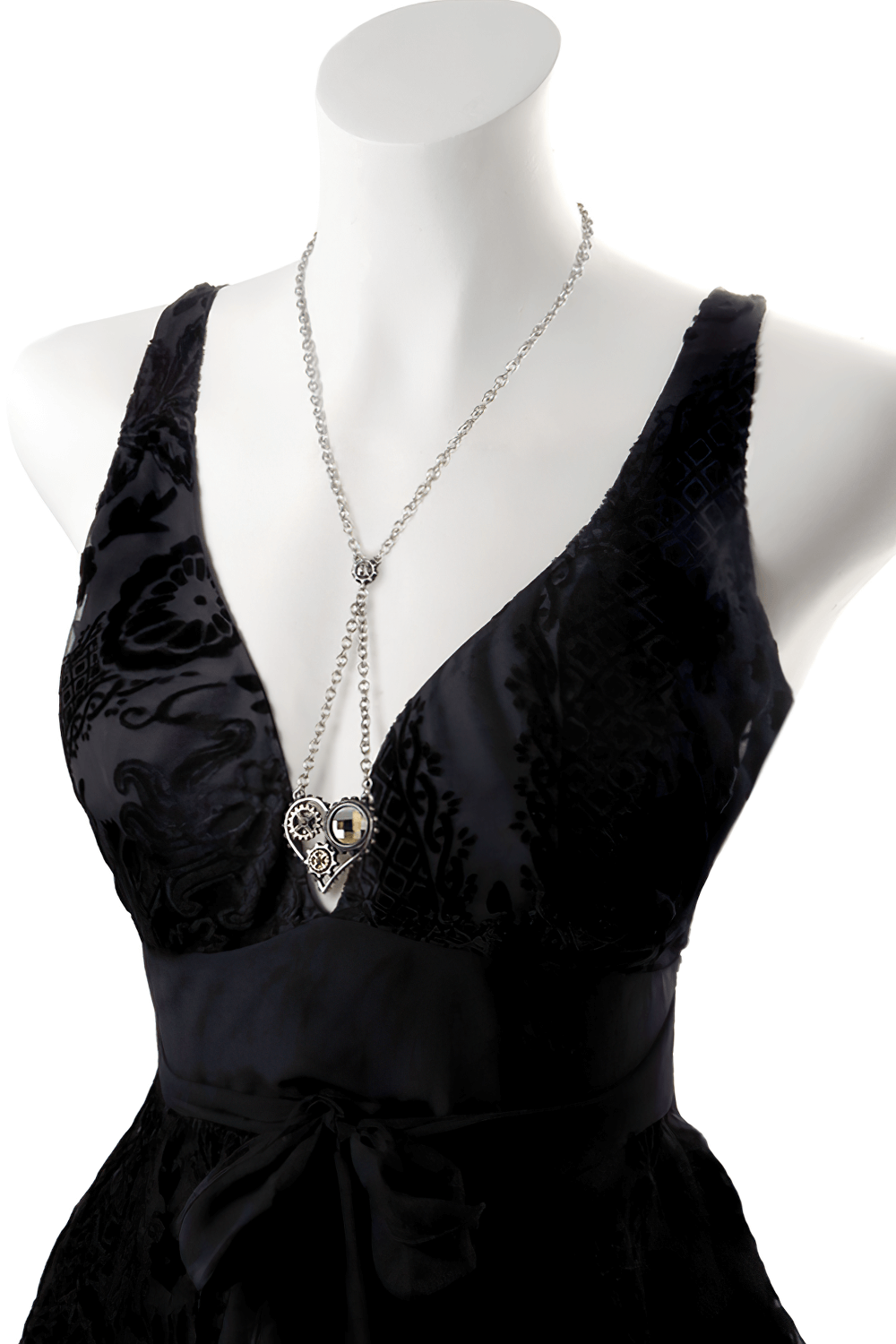 Steampunk Heart Pendant with Gears and Crystal Accent displayed on a stylish black dress mannequin.