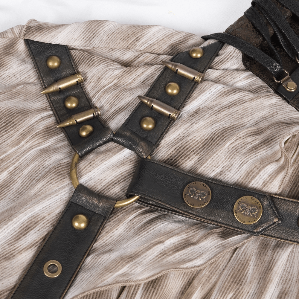 Close-up of steampunk corset belt with metal embellishments on layered maxi skirt, showcasing gothic style.