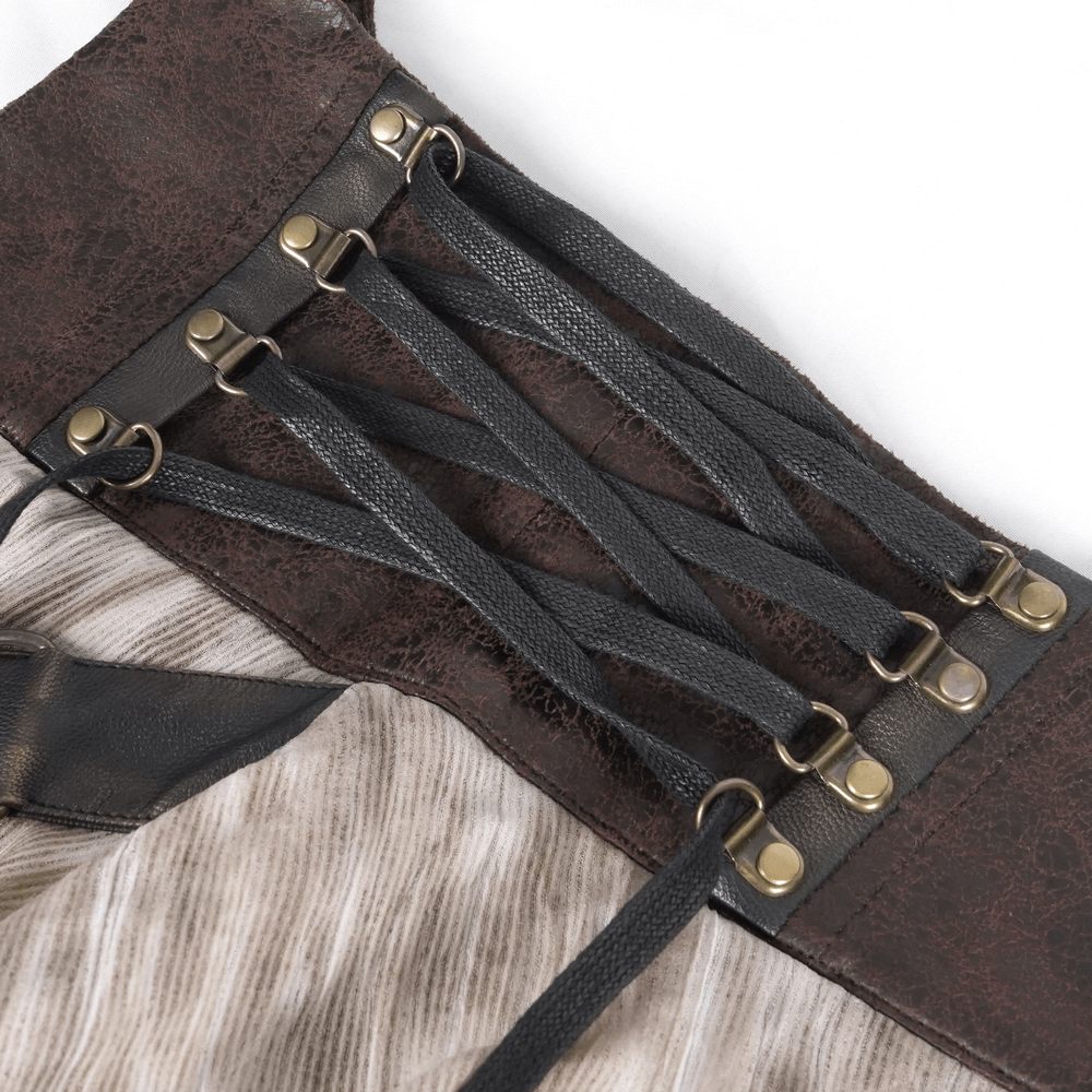 close-up of steampunk corset belt with lace-up detail and metal embellishments on a layered maxi skirt