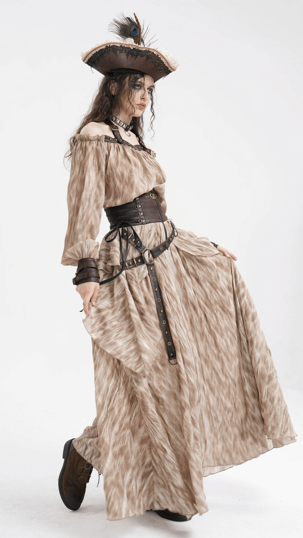 Steampunk-inspired model showcasing a flowing maxi skirt with corset belt and pirate hat, perfect for gothic fashion lovers.