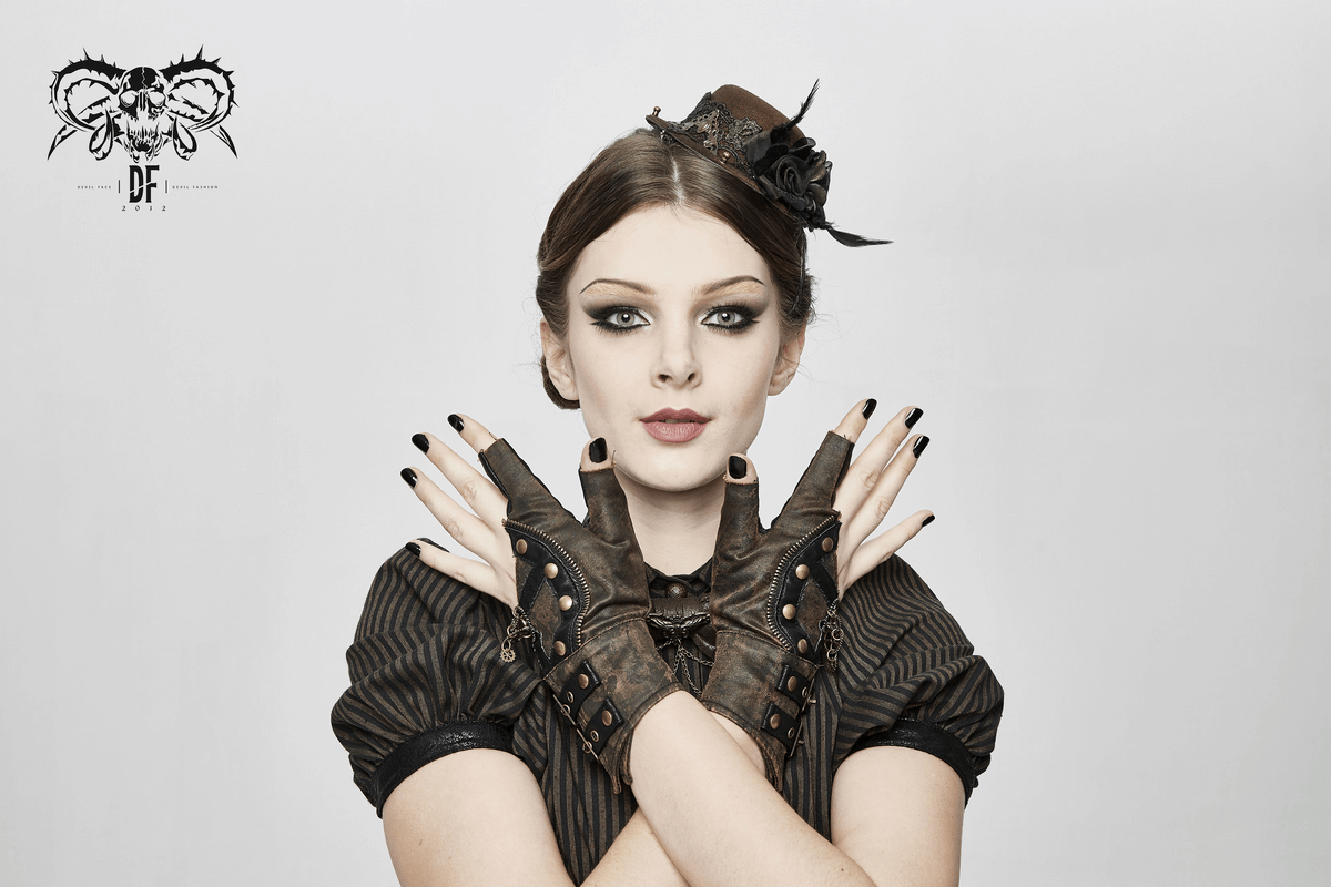 Steampunk women's leather gloves with rivets, styled with a chic black outfit, perfect for quirky fashion lovers.